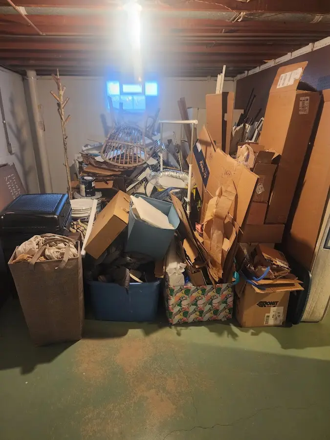 Roll-off dumpster container at job site for Concrete Dumpster Rental in Houlton